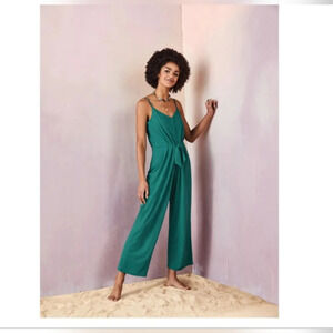 Esmara green jumpsuit. Size 6 spaghetti strap adjustable